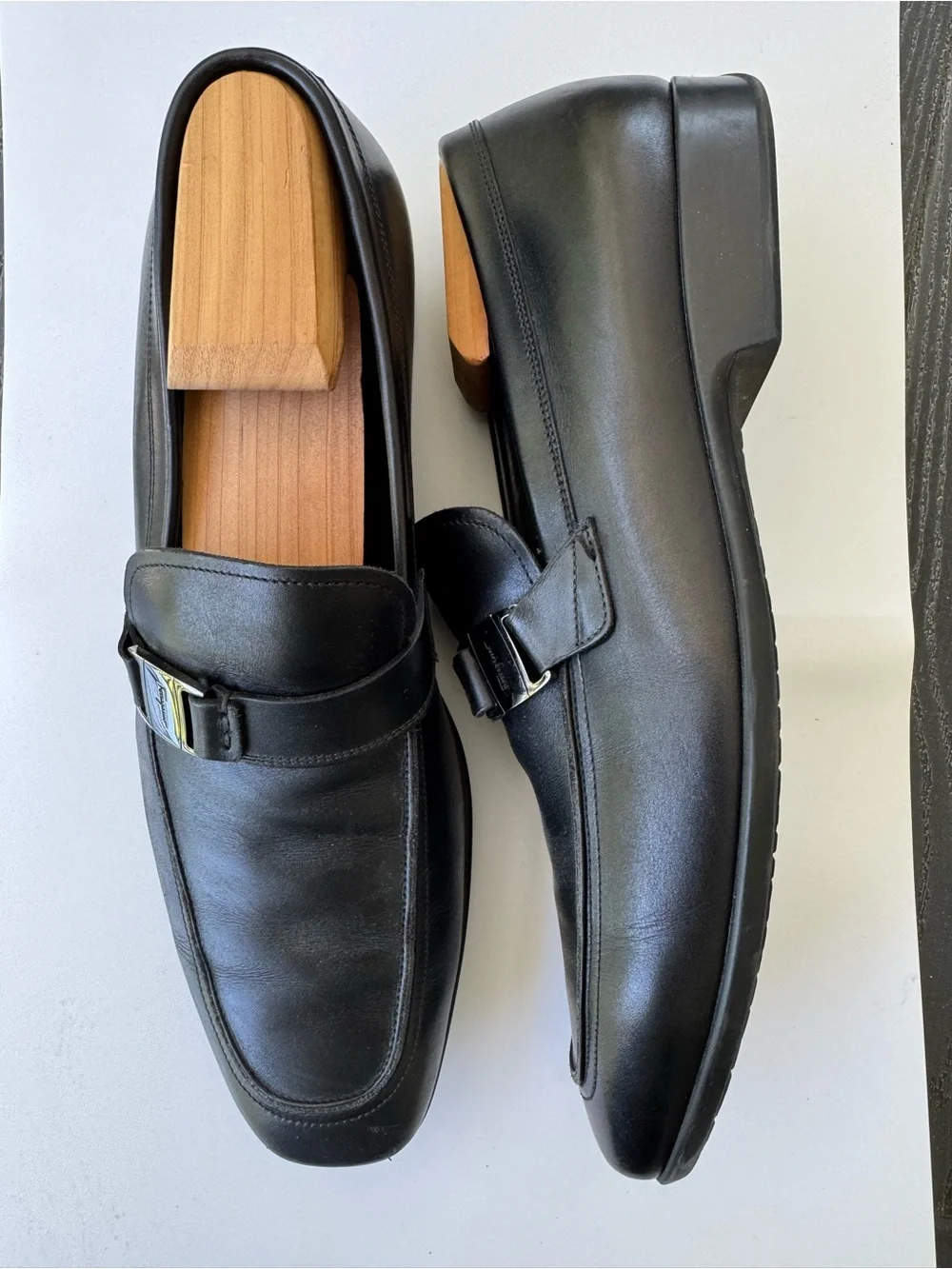 Salvatore Ferragamo Black Leather Slip-On Loafers with Buckle Accent